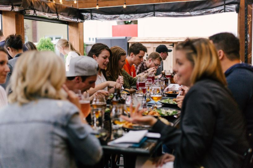 Young adults on a restaurant patio